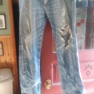 Rustler Jeans 36×34, clean, holes from wear.